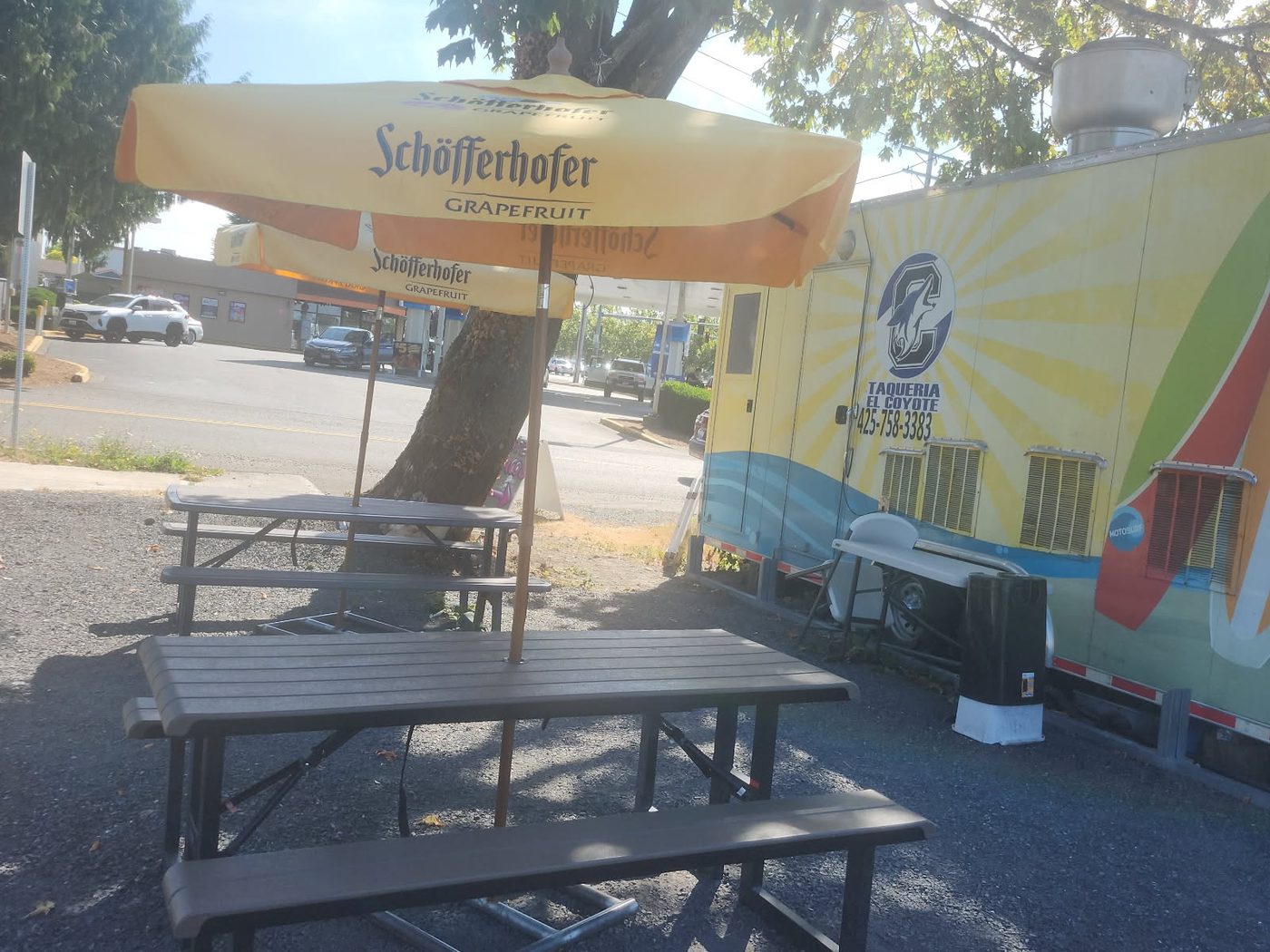 The Taqueria El Coyote food truck with outdoor seating.